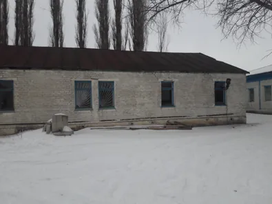 Продажа, здание 900 кв.м с земельным участком, п. Новониколаевское, КН 34:20:030105:99